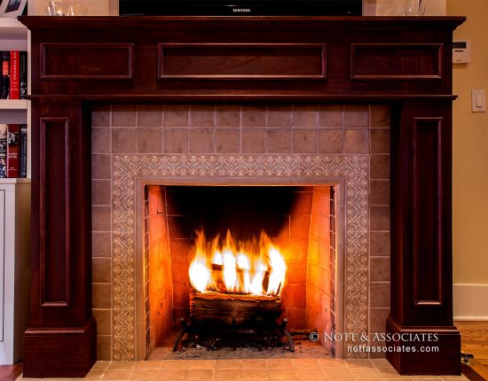 Fireplace with detailed terra cotta.
