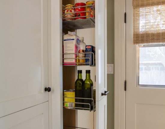 Tall pull-out cabinet off Kitchen