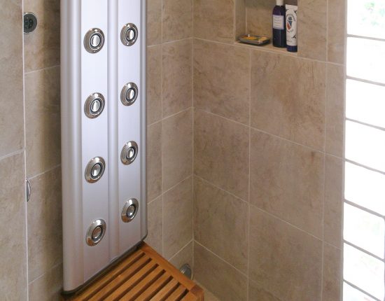 A Full Shower With Waterfall Plumbing Fixture