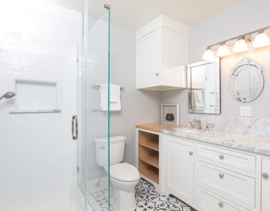Bathroom With Subway Tile And Carrara Marble Countertop