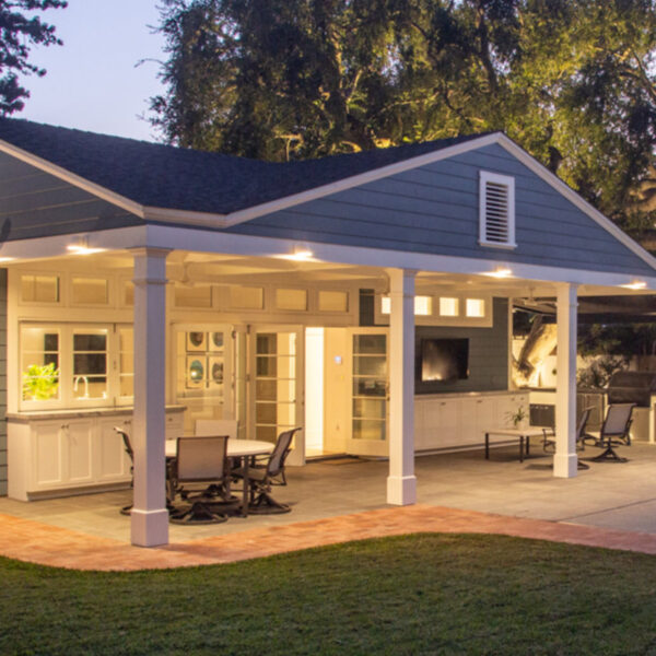New pool house with outdoor amenities and modern design.