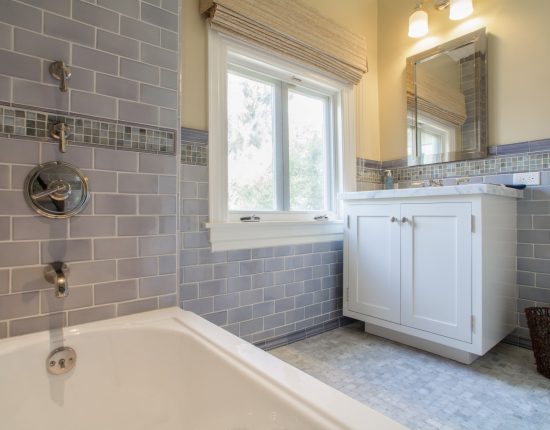 A Craftsman guest bath with modern finishes.