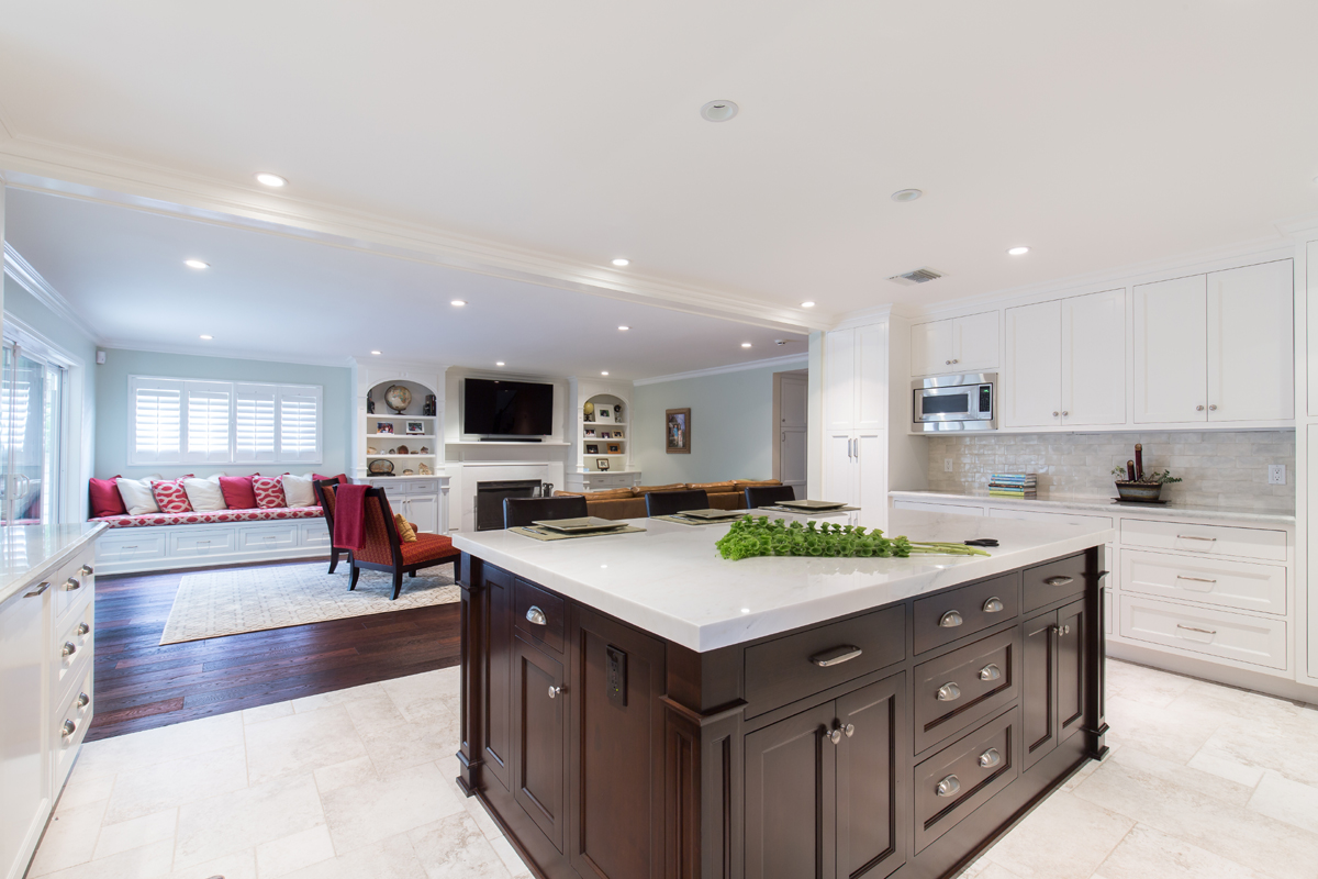 Glazed porcelain floor tile in Versailles pattern under kitchen island