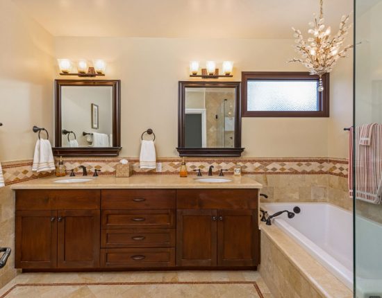 A Master Bath double vanity with decorative tile