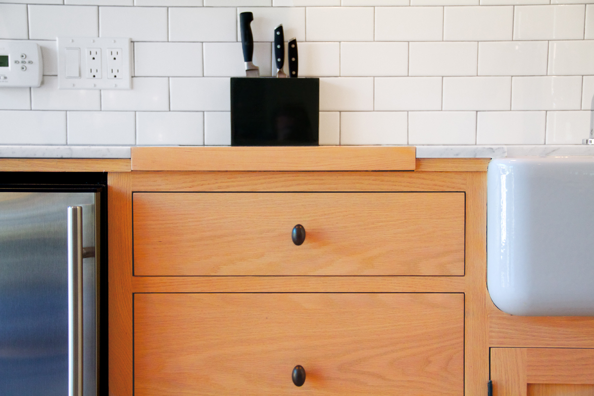 Integrated maple cutting board in the countertop.
