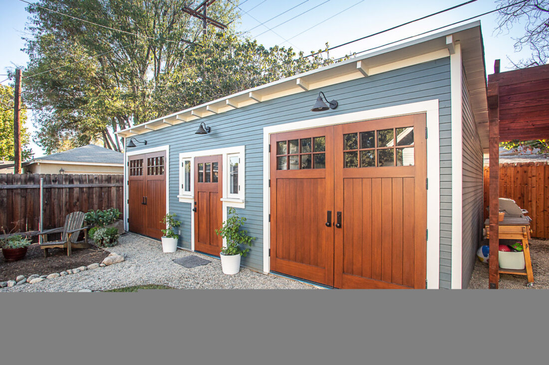 Fully restored Craftsman garage with Douglas fir doors
